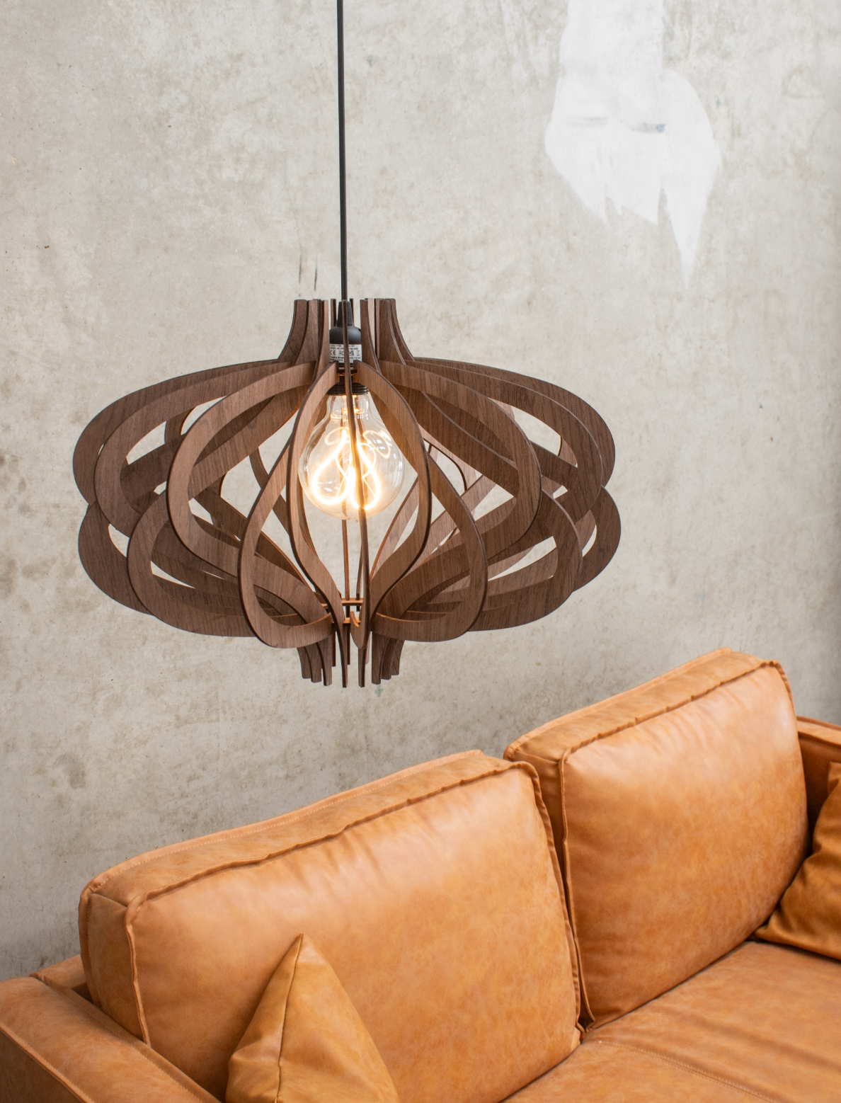 Assembled and installed walnut pendant light